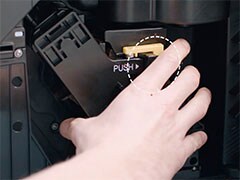 Non riesco a estrarre il gruppo infusore dalla macchina da caffè Philips Saeco