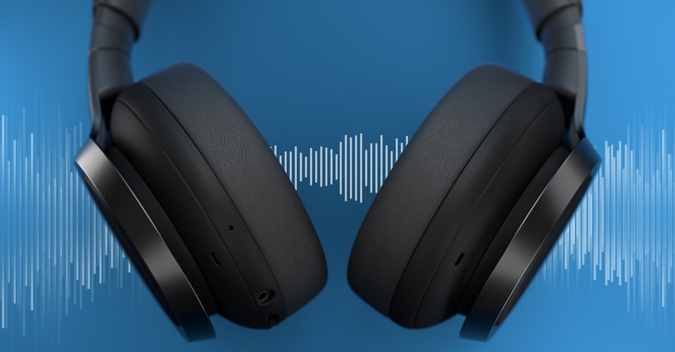 Cuffie con cancellazione del rumore con sottofondo di onde sonore.