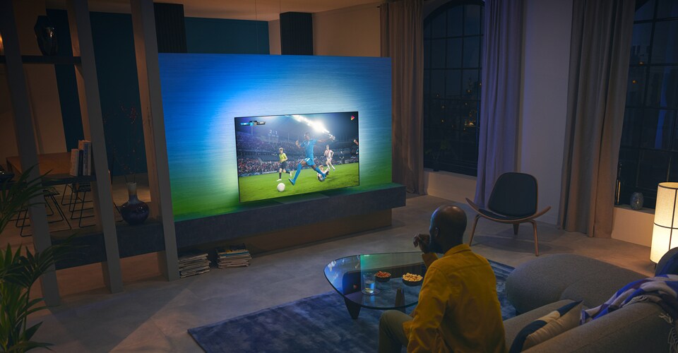 Partita sportiva con il televisore OLED