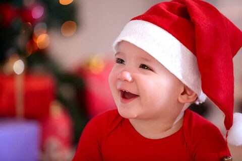 Bimbo piccolo vestito da Babbo Natale